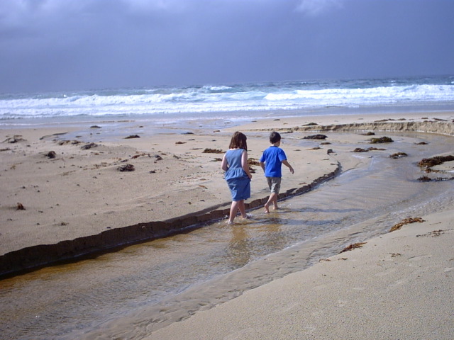 This is REALLY a beach.  Nice orange coloured stagnant water flowing into the ocean...